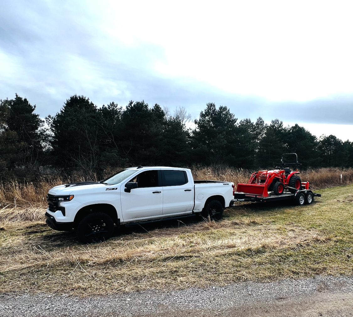 Tractor and truck on a Michigan hunting property